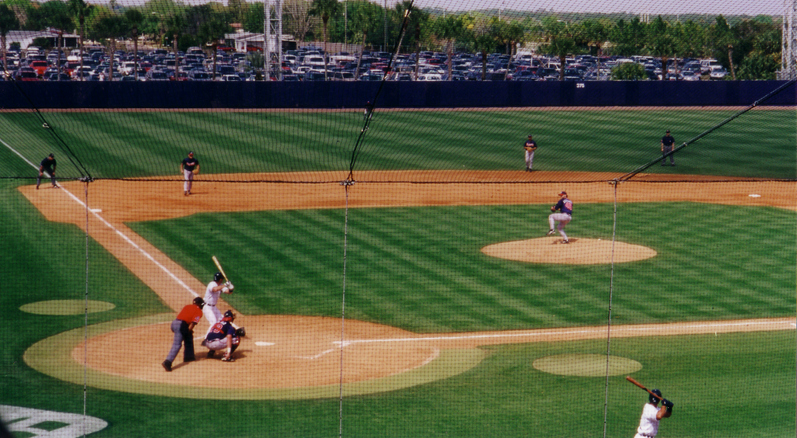 spring training baseball game view from behind the plate