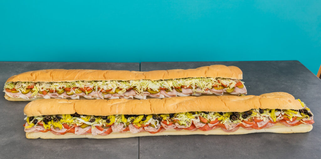 two 3 foot long sub sandwiches