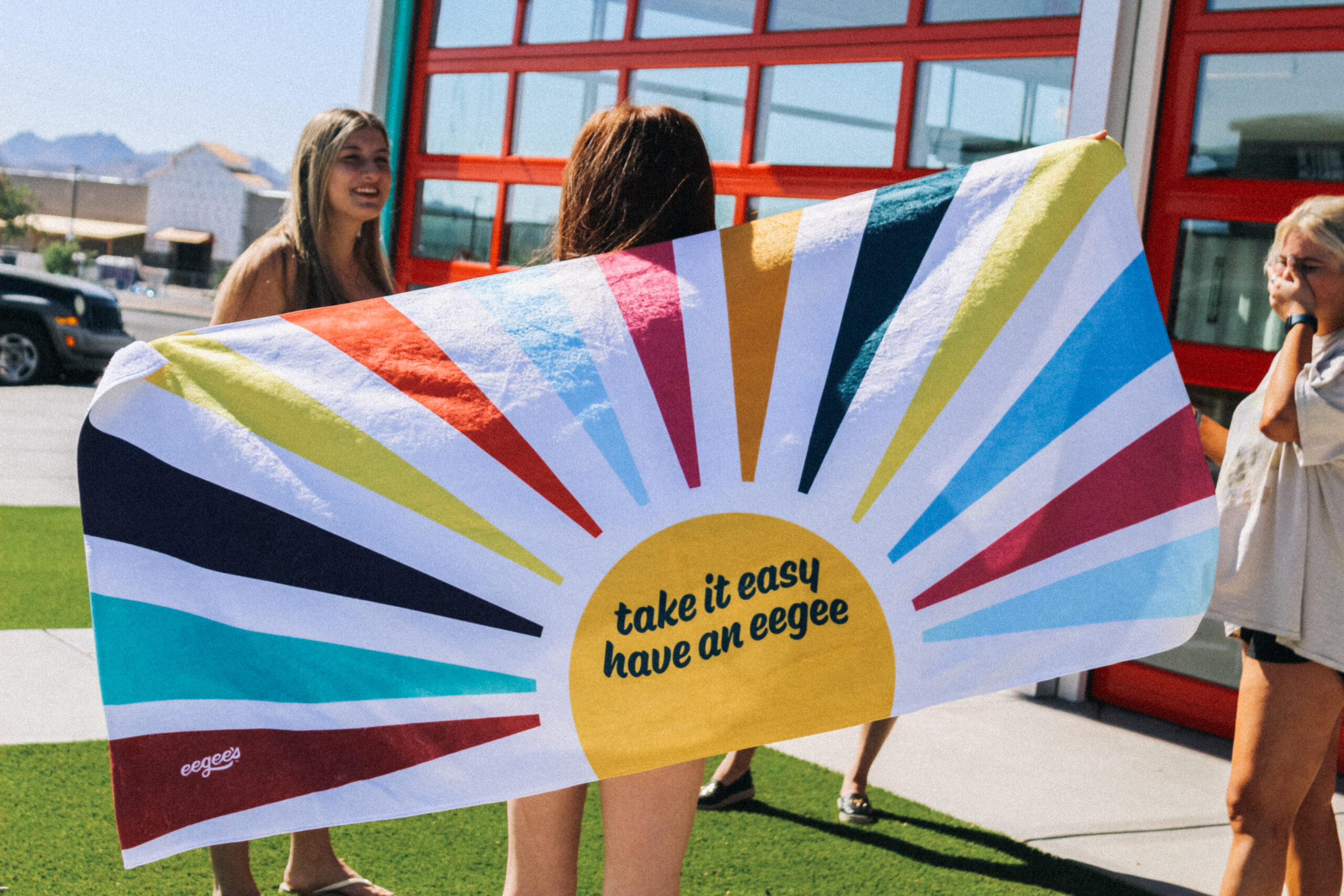 "Take it easy" Beach Towel | Merchandise | eegee's